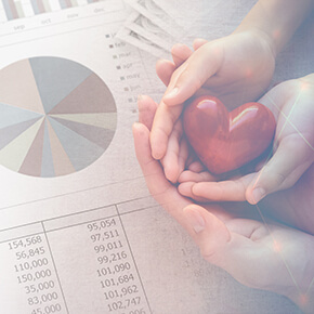 Pie chart with a man and woman hands holding a red heart
