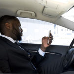 Man on phone in car