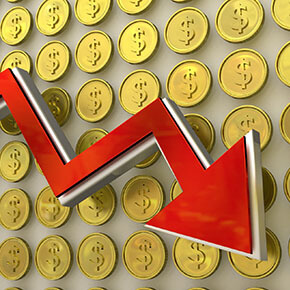 Gold coins with dollar symbols behind a red arrow pointing downward