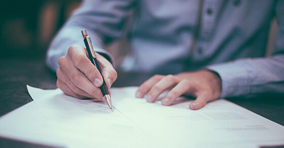 Man writing on paper