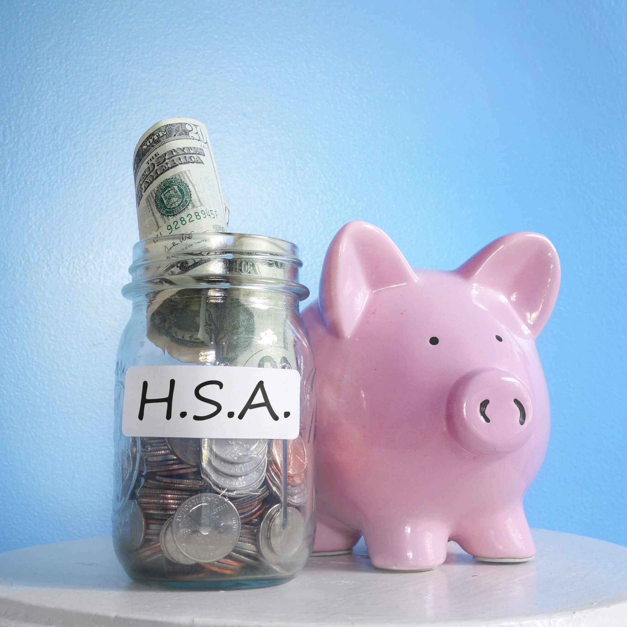 Jar with cash and coins with