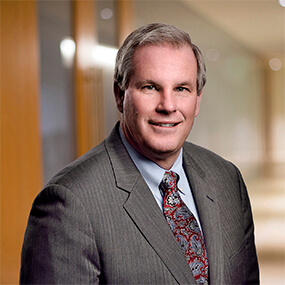 Mike Reilly headshot - managing partner of Dannible & McKee, LLP