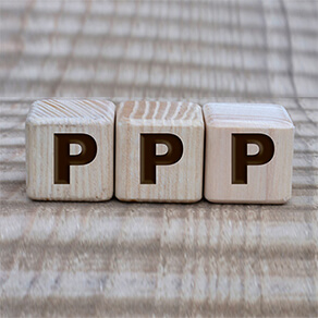 Three wooden blocks with the letter P on each block