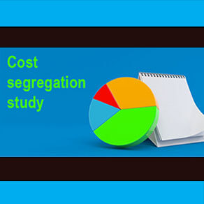 Pie chart next to pad of paper with the words