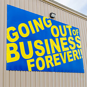 Going out of Business Forever Sign on side of building