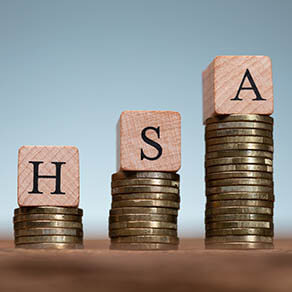 HSA blocks stacked on coins