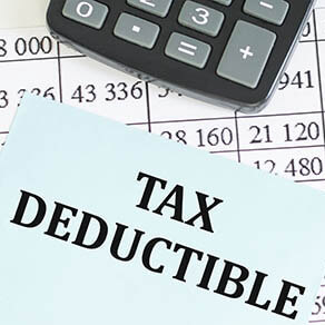 Writing text showing Tax Deductions. Business concept for Finance Incoming Tax Money Deduction written sticky note paper
