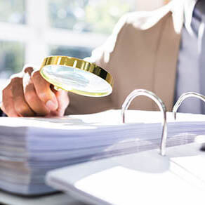 IRS Tax Audit. Auditor Doing Debt Fraud Inspection