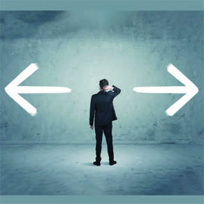 Silhouette of man standing pondering what to do with arrows pointing in each direction
