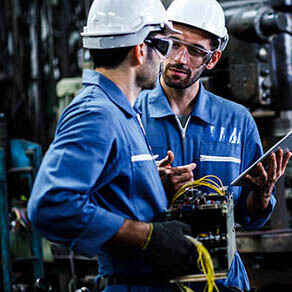 Two,Men,Engineer,Talking,In,Modern,Factory