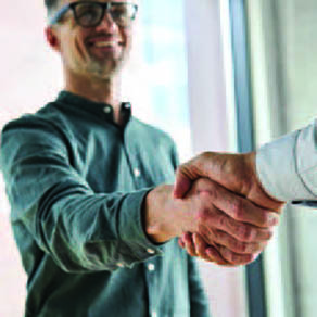 Two business men shaking hands