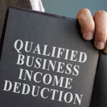Cover of book reading "Qualified Business Income Deduction"