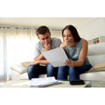 Couple Looking at documents on couch