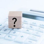 Question mark cube on a calculator