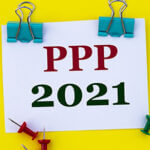 Paper held with binder clips reading "PPP 2021"