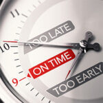 Close up on a conceptual clock with the text early late and on time. Concept of good timing and choosing the right moment. 3D illustration.