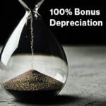 Hourglass on dark background, long banner. Urgency and running out of time concept