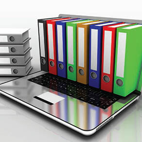 Colorful binders coming out of a computer screen