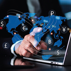 Laptop with map of the world laid over it