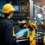 Smart industry robot arms for digital factory production technology showing automation manufacturing process of the Industry 4.0 or 4th industrial revolution and IOT software to control operation .