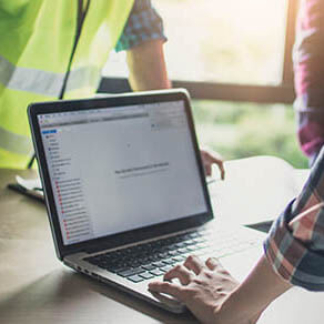 Engineer and worker planning for construction building and renovate in working site