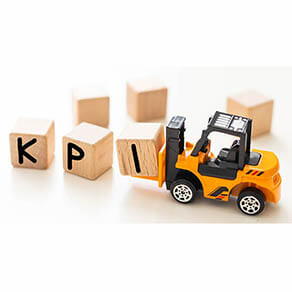 Toy forklift picking up the letter block 