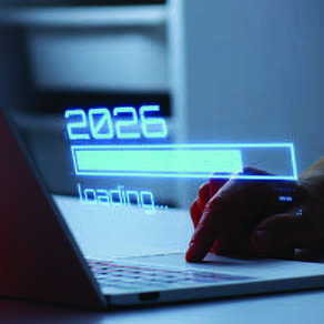 Close up of someone typing on a laptop with an image overlaid on it of 2026 and a bar showing the progress